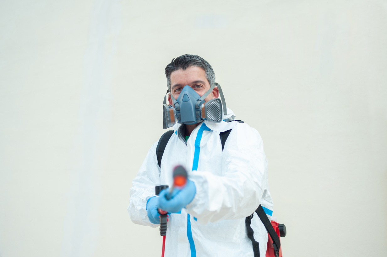 Fumigator sanitizing, cleaning and disinfection. Coronavirus pandemic professional control.